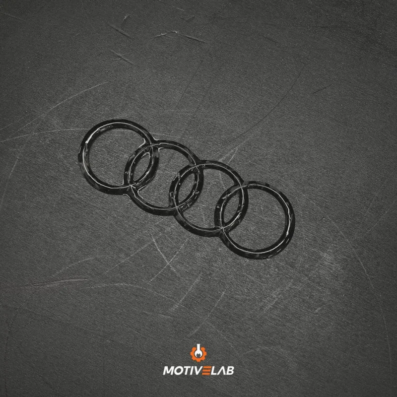 Audi crest with Audi logo in forged carbon fibre