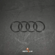 Stemma con logo Audi in carbonio Audi