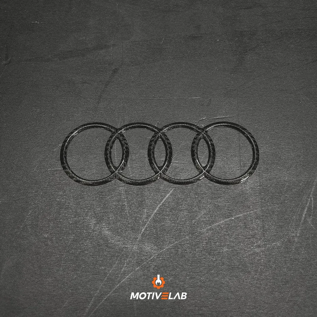 Stemma con logo Audi in carbonio Audi