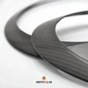 Modanatura fari anteriori in carbonio MINI R55 / R56 / R57 / R58 / R59