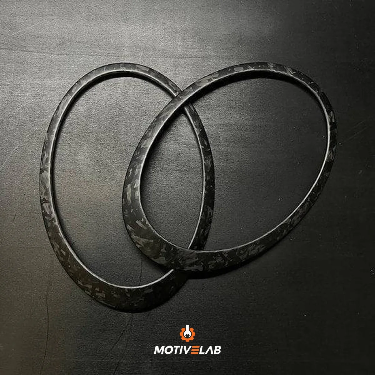 Modanatura fari anteriori in carbonio forgiato MINI R55 / R56 / R57 / R58 / R59