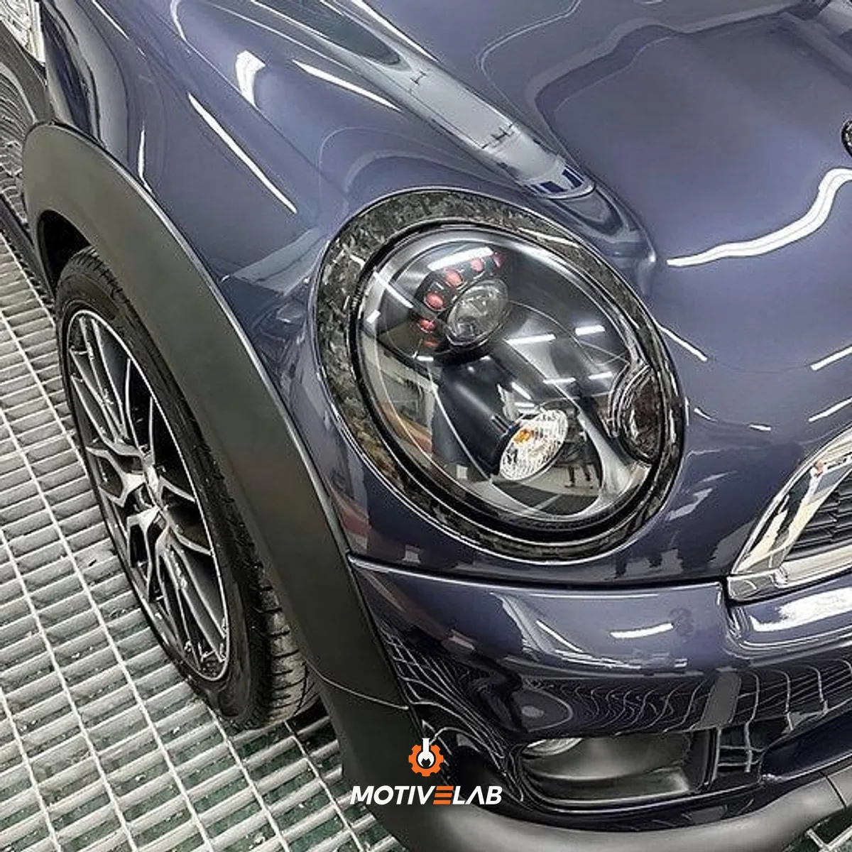 Modanatura fari anteriori in carbonio forgiato MINI R55 / R56 / R57 / R58 / R59