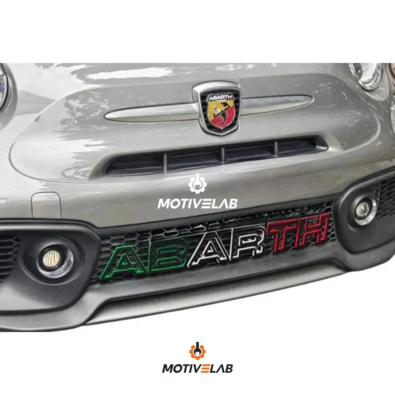 'Abarth' lettering on the grille and bumper — photo 1